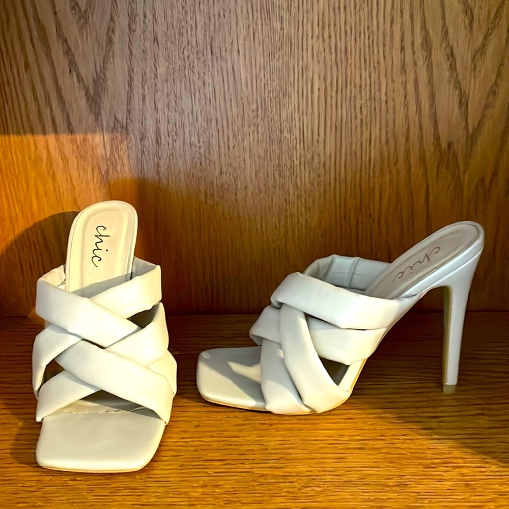 From the brand chic, these are an adorable, woven, cream colored sandal.